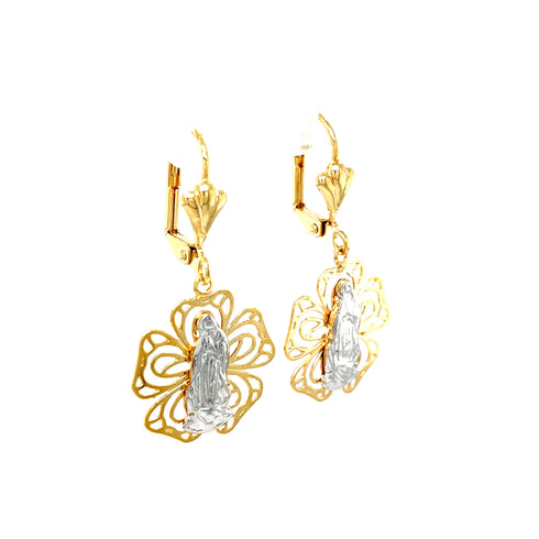 The Virgin Mary Flower Dangle Earrings are crafted in 14k gold filled material accented with a silver tone, featuring intricate floral designs. Lead and nickel free, these earrings come with a hook clasp and showcase a centerpiece that resembles a standing figure.